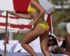 Exclusive: Singer Dua Lipa Wears A Yellow Bikini As She Takes A Dip In The Ocean With Her Sister In Miami, Then Greets Her Boyfriend On The Sand