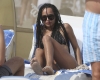 Zoe Kravitz shows off her beach body in a string bikini in Miami Beach