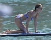 Kimberley Garner parades her envy inducing figure in a skimpy blue bikini as she hits the beach in Mykonos