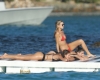 Devon Windsor enjoys her first day married at the beach with her bikini clad model friends